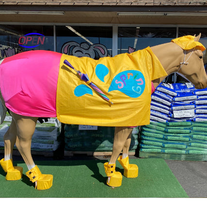 Curbside / In-Store PickupHorse statue dressed in a raincoat and boots